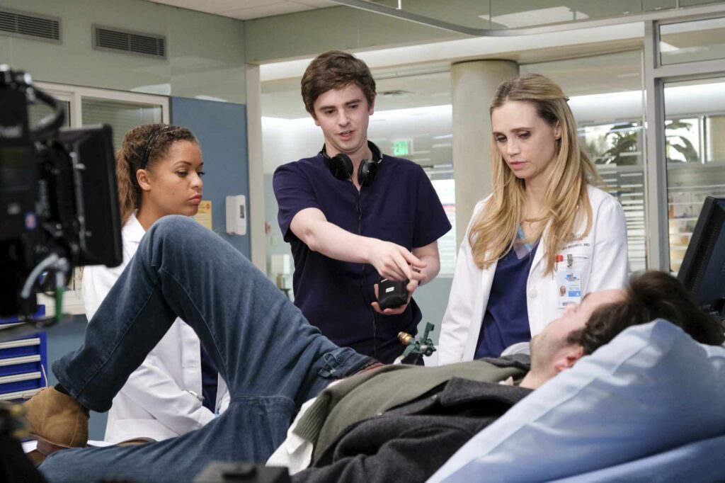doctors talking to patients and family member
