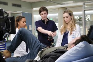 doctors talking to patients and family member